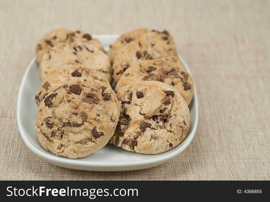 Delicious chocolate chip cookies in bowl