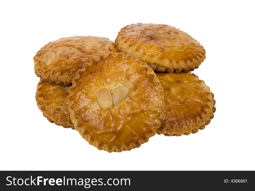 A typical dutch cookie called gevulde koek isolated on a white background