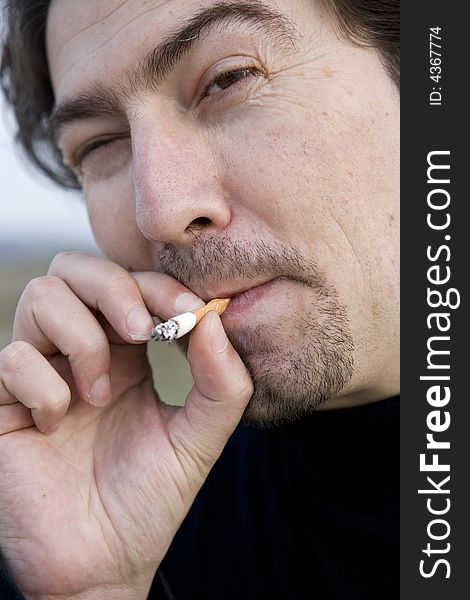 Man Smoking Cigarette