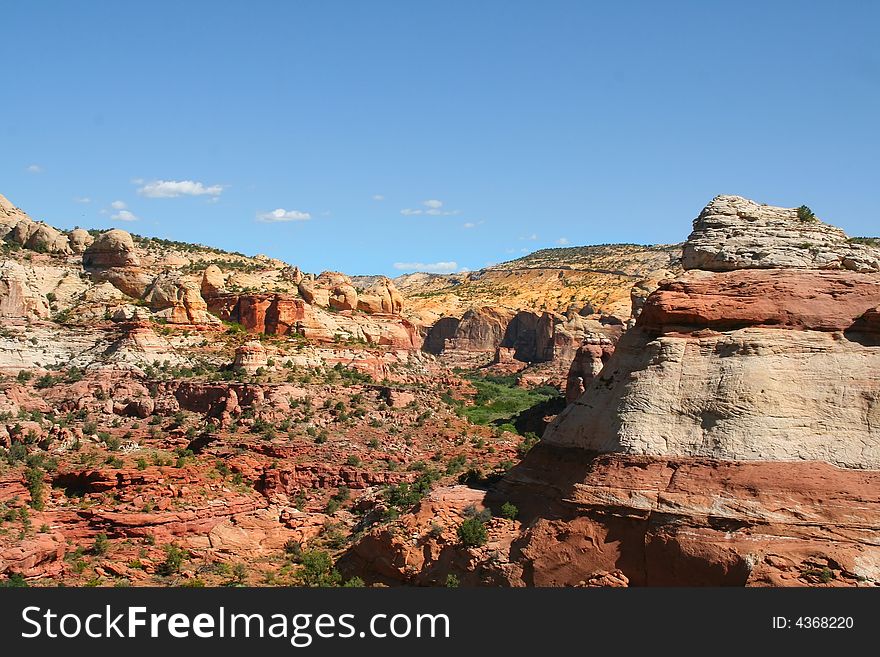 View of the red rock formations in Capitol Reef National Park with blue skyï¿½s. View of the red rock formations in Capitol Reef National Park with blue skyï¿½s