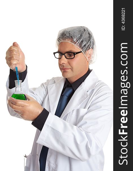 Scientist in the laboratory using a pipette to add a laboratory reagent or sample to a round flask of solution. Scientist in the laboratory using a pipette to add a laboratory reagent or sample to a round flask of solution.