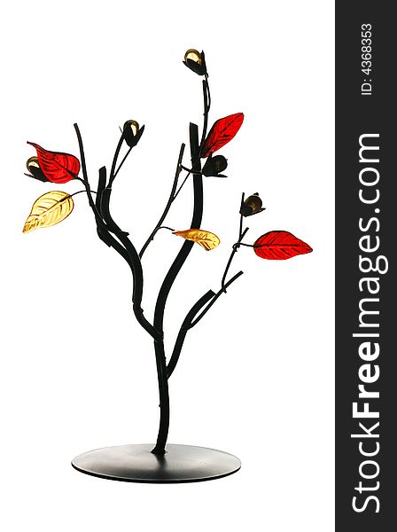 The forged tree with glass leaves. Isolated from white background