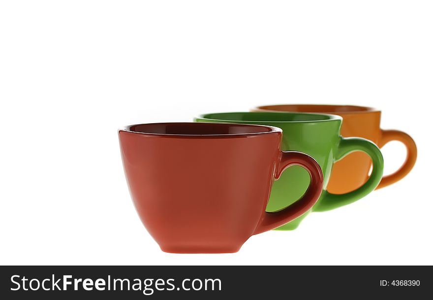 Three color cups isolated on a white background