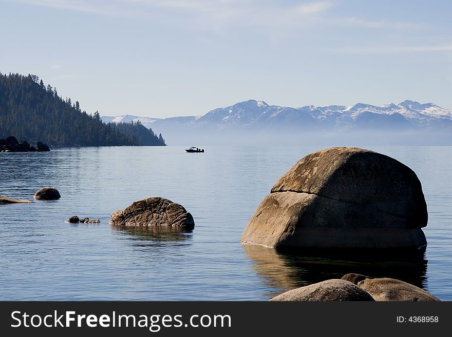 Foggy Lake Tahoe with clouds over it. Foggy Lake Tahoe with clouds over it