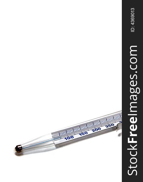 A glass mercury thermometer on white seamless background. A glass mercury thermometer on white seamless background.