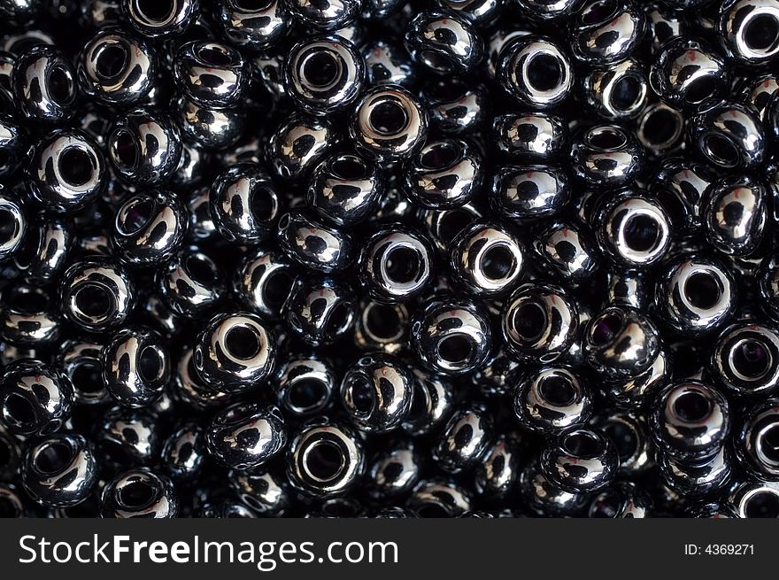 Leaden-colored Beads Background