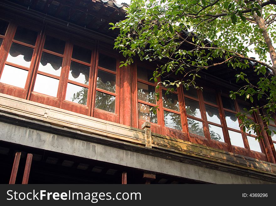 The view of the eave of an old special architecture.This picture is taken in Net lion wood in Suzhou ,China. The view of the eave of an old special architecture.This picture is taken in Net lion wood in Suzhou ,China.