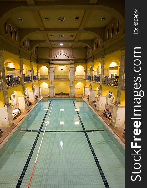 Elegant public baths interior, yellow walls