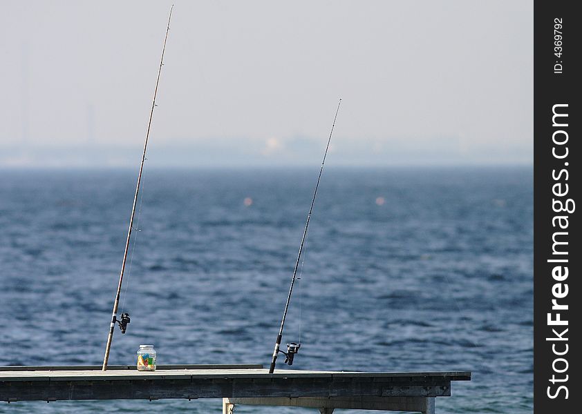 Fishing rods on a bathing jetty