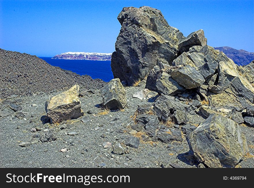 A view from the volcanic island in Santorini. A view from the volcanic island in Santorini