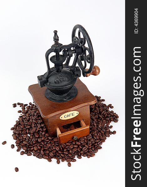 Coffee-grinder with coffee bins on white background.