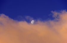 Moonrise Over Sunset Clouds Stock Photo Moonrise Over Sunset Clouds Stock Photo