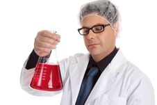 Chemist Carrying Large Flask Stock Photo Chemist Carrying Large Flask Stock Photo