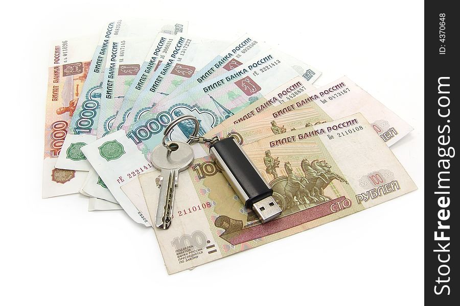 Russian rubles and usb drive with key on a white background