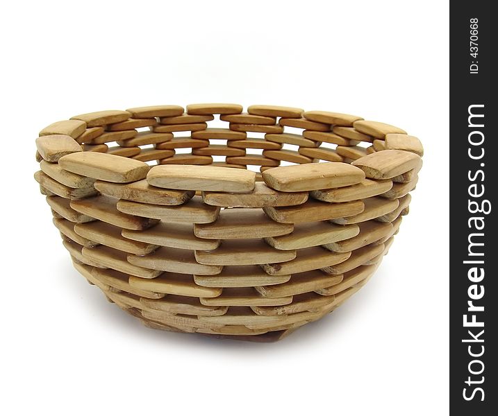 Wooden bowl on a white background