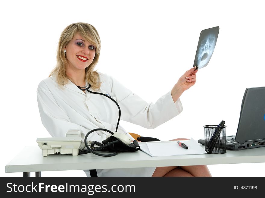 Young doctor with stethoscope on white background