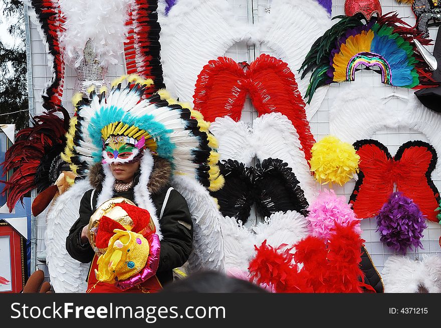 The headdress and the mask of the feather creation. The headdress and the mask of the feather creation