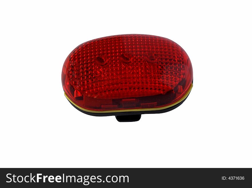 Red rear bicycle light isolated with a clipping path. Red rear bicycle light isolated with a clipping path