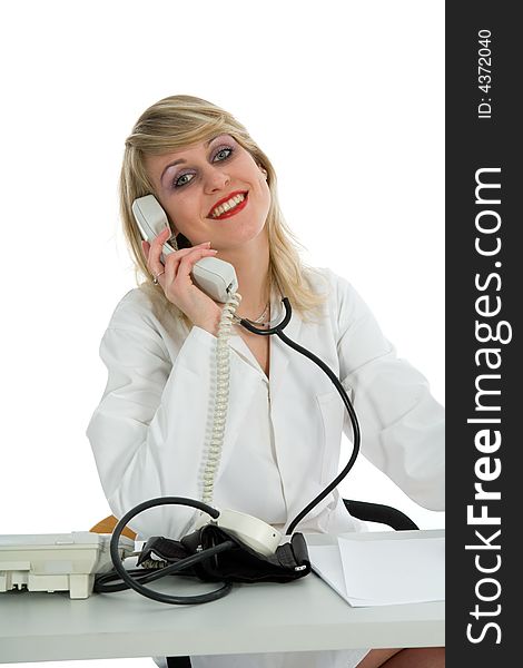 Young doctor with stethoscope on white background