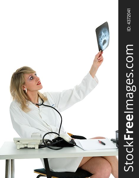 Young doctor with stethoscope on white background