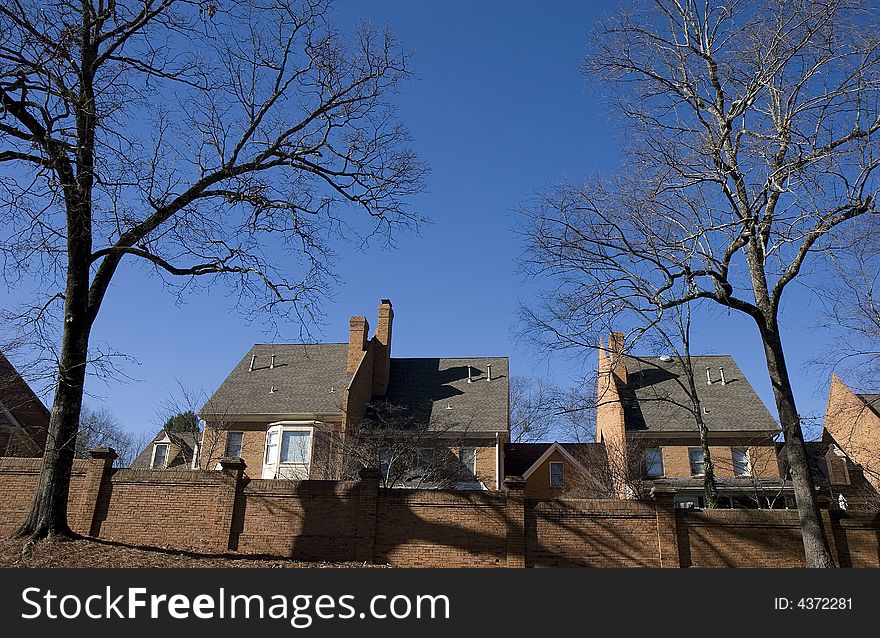 Winter Houses And Brick Wall