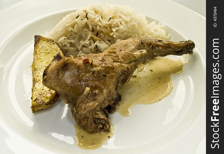 Leg of hare with rice and potato. Leg of hare with rice and potato