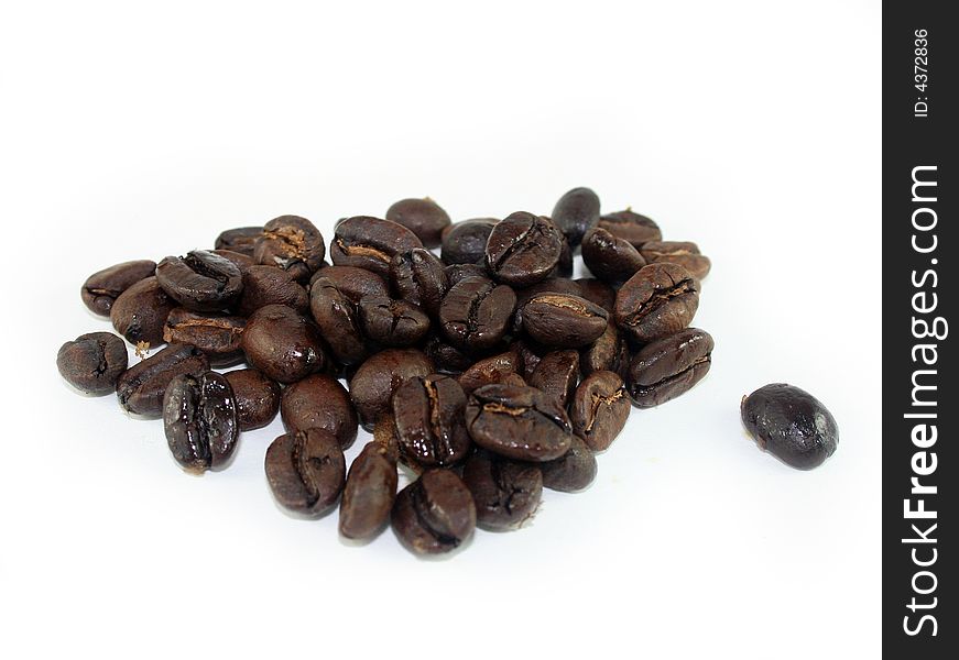 Close up photo of whole gourmet coffee beans