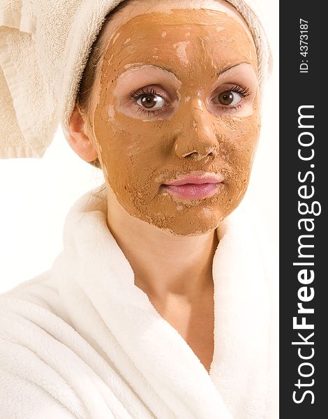 Beautiful woman wearing a skin mask. Beautiful woman wearing a skin mask