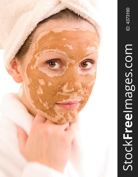 Beautiful woman wearing a skin mask. Beautiful woman wearing a skin mask