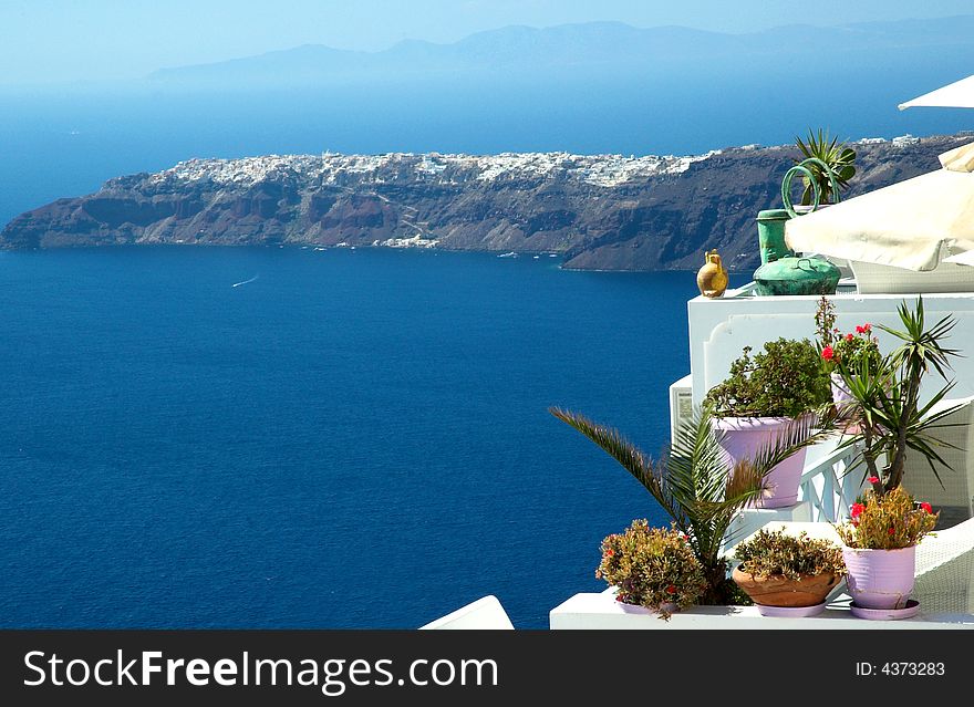 View of the Aegean sea from a clifftop restaurant in Santorini. View of the Aegean sea from a clifftop restaurant in Santorini