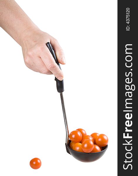 Hand with red tomatoes isolated on a white background