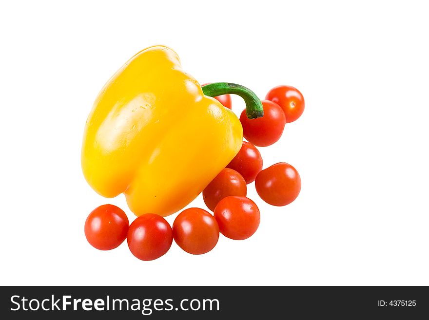 The set of vegetables:Pepper and tomatoes isolated on a white background