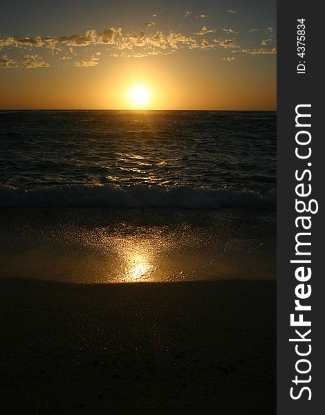 Beautiful sunset scene on a sandy beach. Australia.