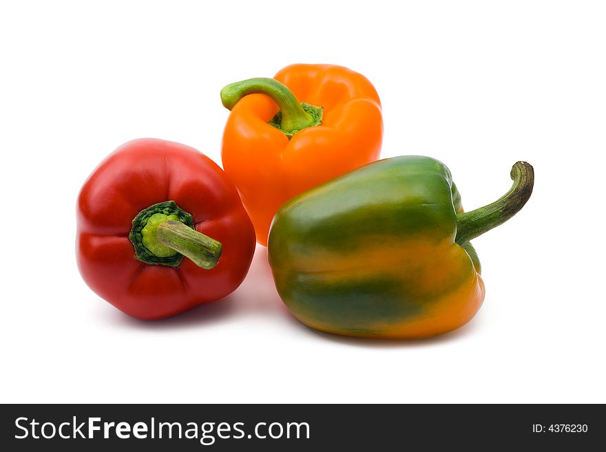 Three peppers, isolated on white background