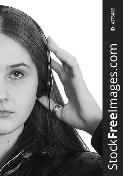 Young girl in headphone on the white background. Young girl in headphone on the white background