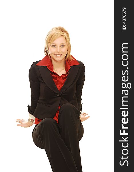 An friendly blond girl in an red blouse and black jacket sitting in an studio
for white background. An friendly blond girl in an red blouse and black jacket sitting in an studio
for white background.