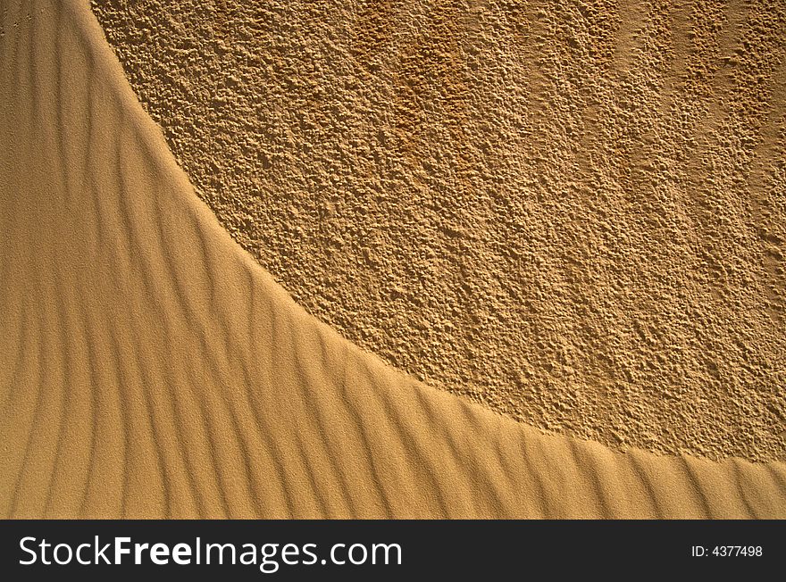 Texture of the sand of a desert dune. Texture of the sand of a desert dune.