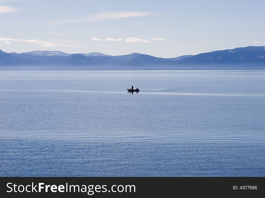 Foggy Lake Tahoe with clouds over it. Foggy Lake Tahoe with clouds over it