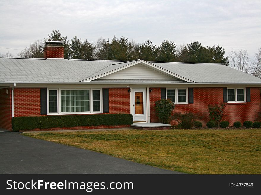 Red brick, single level home. Red brick, single level home.