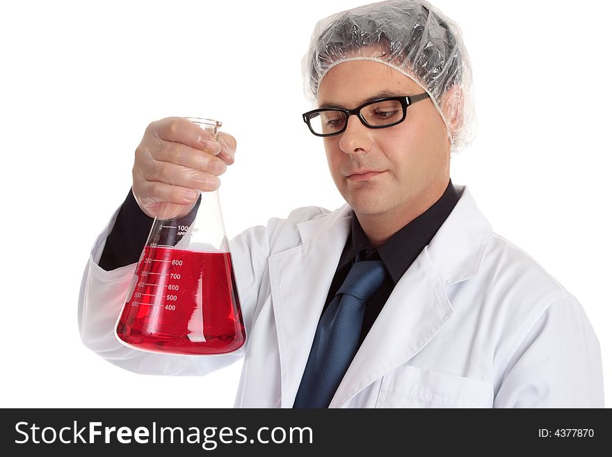 A chemist or laboratory worker holding a large flask of liquid. A chemist or laboratory worker holding a large flask of liquid.