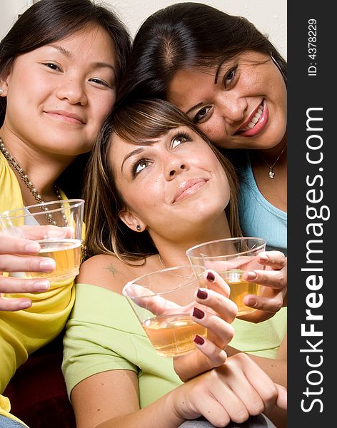 3 female friends enjoying a drink. 3 female friends enjoying a drink.