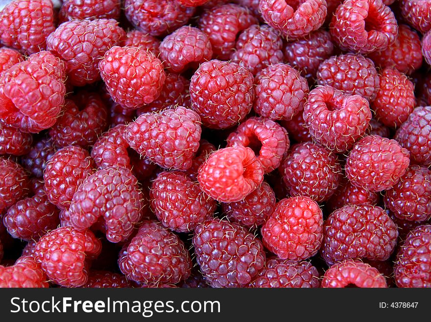 Sweet red raspberries texture, Rubus idaeus, natural background