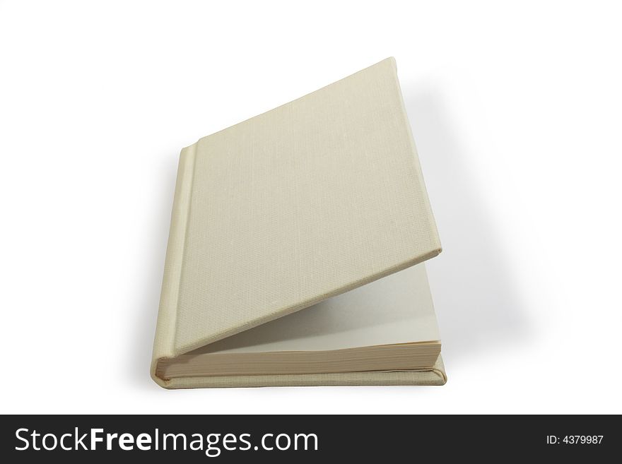 Open light-gray book in hardcover lying on white background. Open light-gray book in hardcover lying on white background