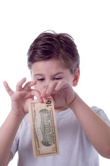 The Little Boy Is Going To Tear A Denomination Royalty Free Stock Photography The Little Boy Is Going To Tear A Denomination Royalty Free Stock Photography