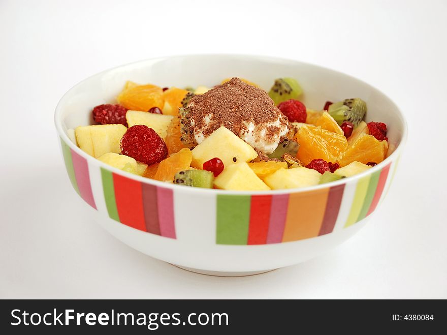 Bowl full of delicious fruit salad.