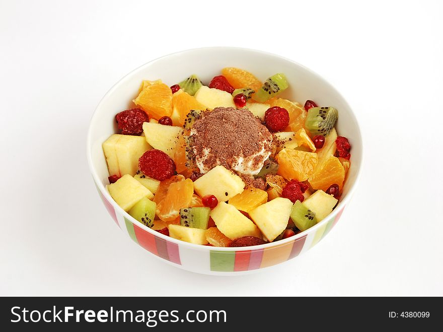 Bowl full of delicious fruit salad.