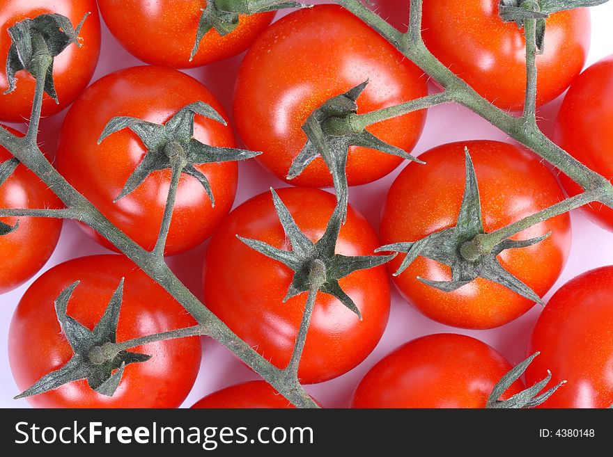 Background- fresh red cherry tomatoes