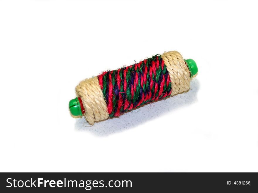 Spool of colored yarn isolated on white background