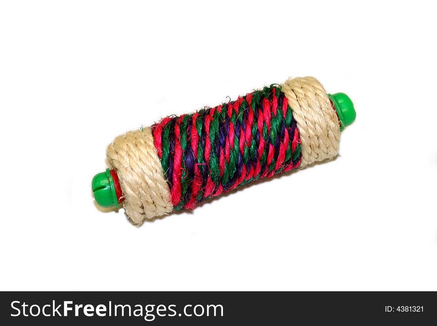 Spool of colored yarn isolated on white background