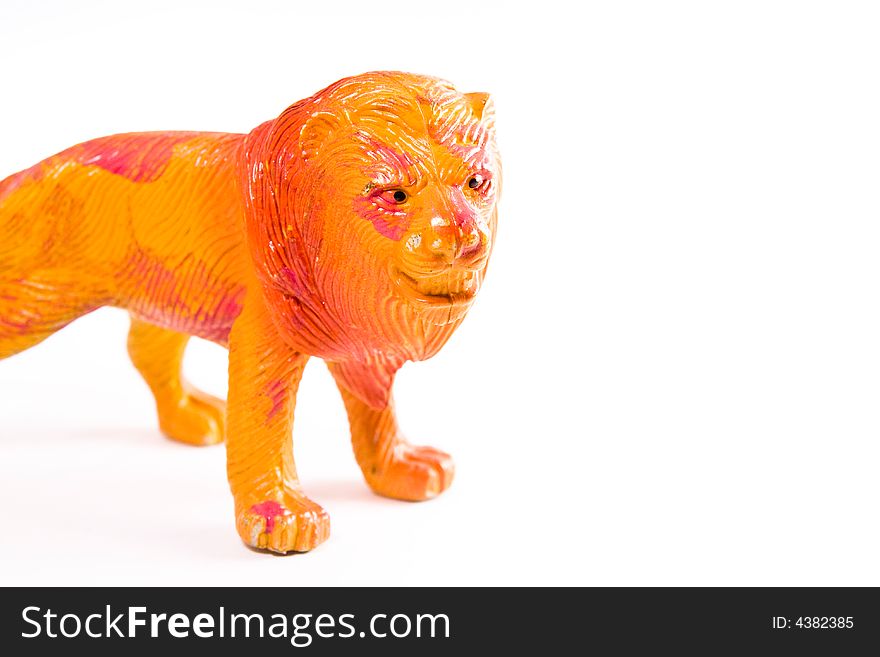 Single lion macro figure toy on the white background